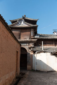 Low angle view of old building against clear sky