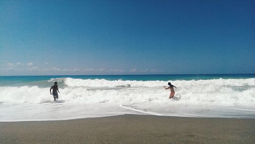 People enjoying at beach