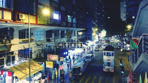 Buildings in city at night