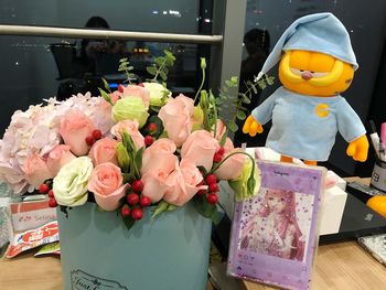 Close-up of various flowers on table