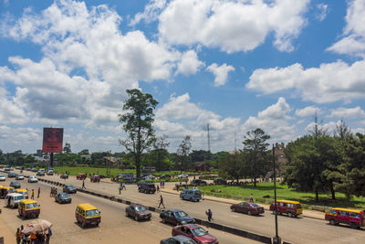 Cars on road against sky