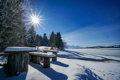 Scenic view of snow covered trees against sky