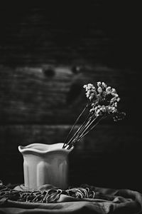 Close-up of flowering plant in vase on table