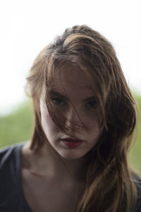 Close-up portrait of beautiful young woman