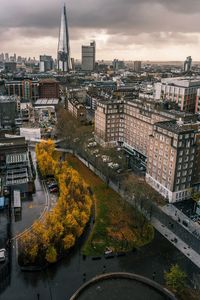 High angle view of river amidst buildings in city