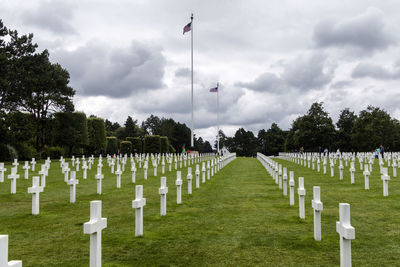 Panoramic shot of cemetery against sky