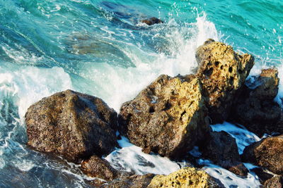 High angle view of rocks on beach