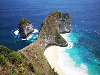 High angle view of rocks in sea