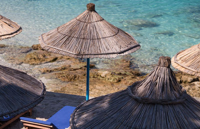 High angle view of lounge chairs on roof