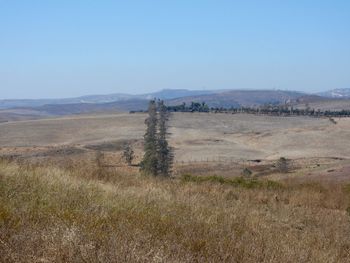 Scenic view of land against sky