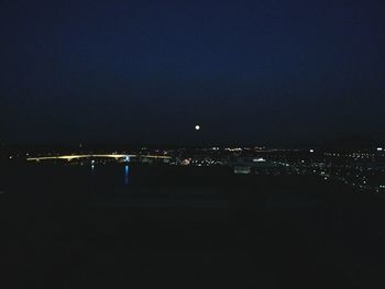 Illuminated cityscape at night