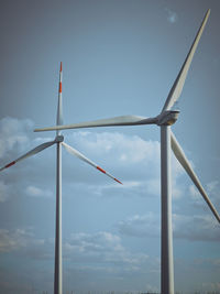 Low angle view of windmill against clear sky