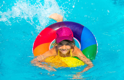 Portrait of girl in swimming pool