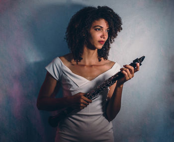 Young woman playing guitar