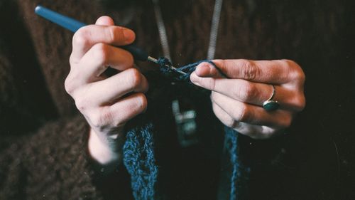 Cropped image of woman holding hands