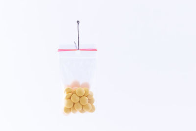 Close-up of cake against white background