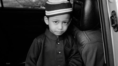 Portrait of cute boy in traditional clothing