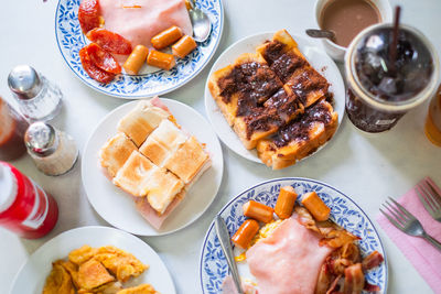 High angle view of breakfast served on table