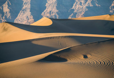 Almost golden hour at astonishing golden dunes showing somew ripples and patterns at death valley