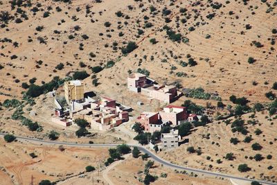 High angle view of buildings on field