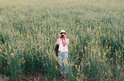 Full length of man standing on field