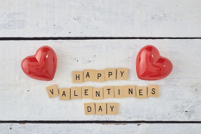 Close-up of heart shape on white table