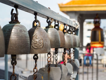 Close-up of padlocks hanging on street