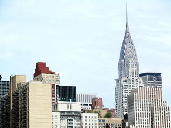 Modern skyscrapers against sky