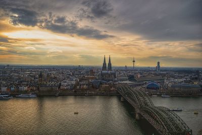 High angle view of city at sunset