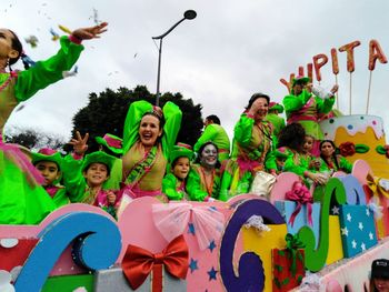 Group of people against the sky