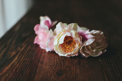 Close-up of pink flowers on table