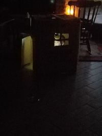 Chairs and table in illuminated room