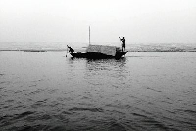 Boat sailing in sea