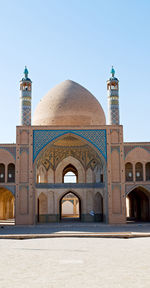 View of historical building against clear blue sky