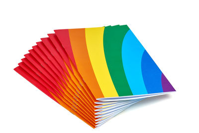 Colorful umbrella against white background