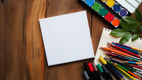 High angle view of multi colored pencils on table