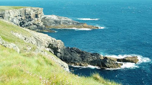 Scenic view of sea against blue sky