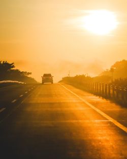 Empty road at sunset