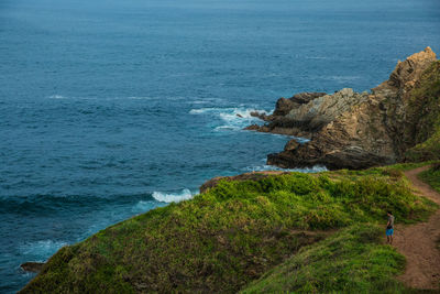 High angle view of beach by sea against sky