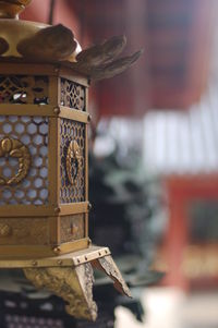 Close-up of lamp at temple