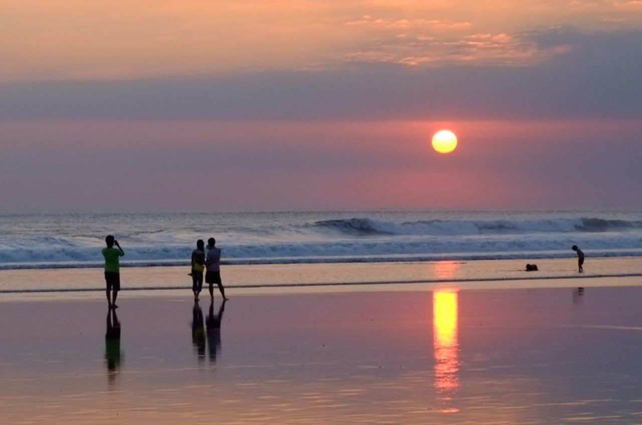 sunset, sea, horizon over water, water, sun, scenics, sky, beach, orange color, beauty in nature, leisure activity, reflection, tranquil scene, lifestyles, silhouette, tranquility, men, idyllic, vacations