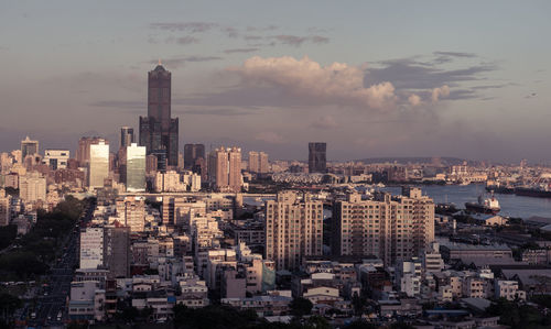 Modern buildings in city against sky