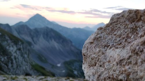 Scenic view of mountains against sky during sunset