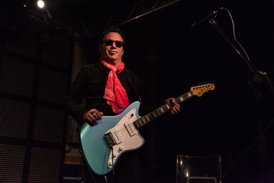 Young man playing guitar