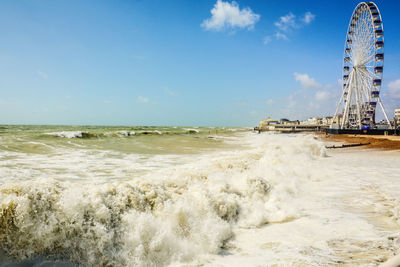 Scenic view of beach against sky