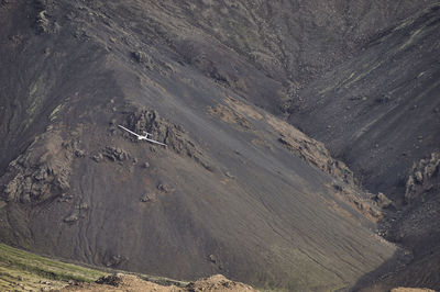 Aerial landscape of aircraft among powerful mountains