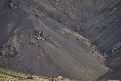 Aerial landscape of aircraft among powerful mountains