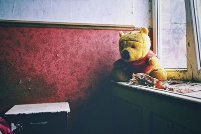 Stuffed toy on window sill