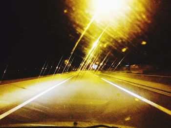 Light trails on road at night