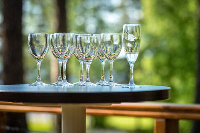 Close-up of empty glasses on table